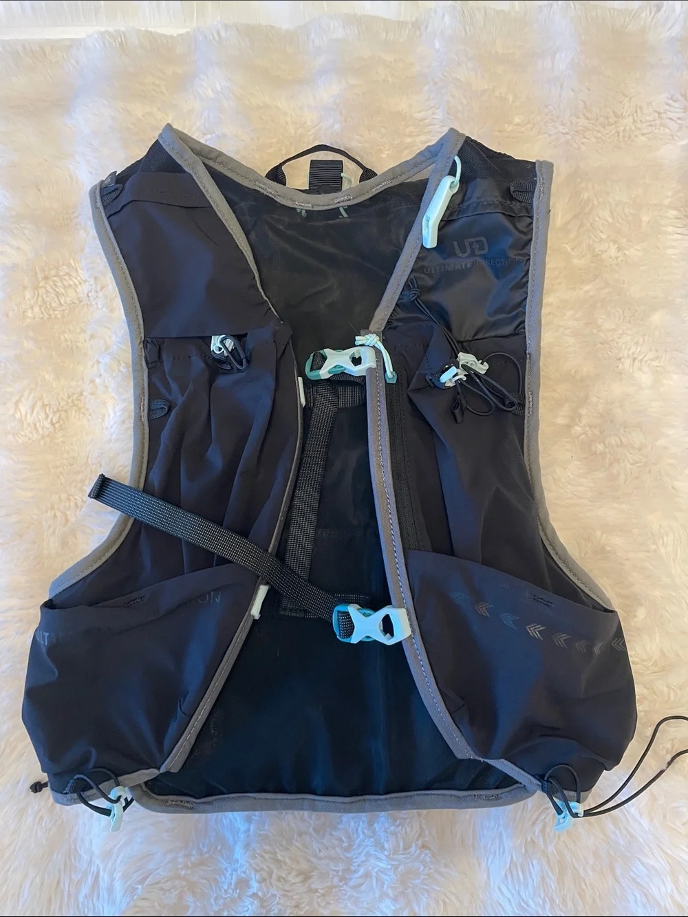 Ultimate Direction Black Women's running Vest with Mint Accents